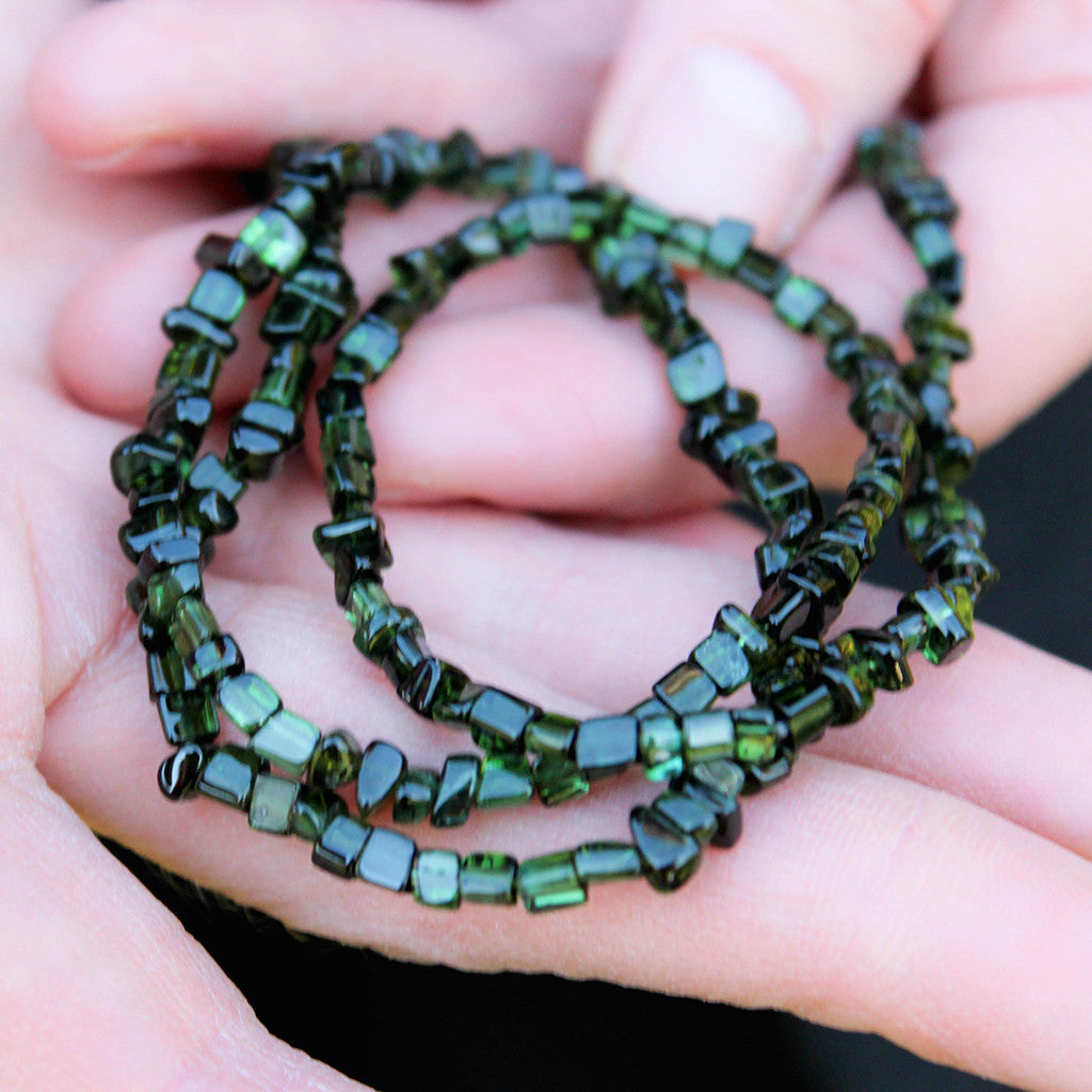 Crystal healing Green Tourmaline necklace known for increasing courage, vigor, and vitality.