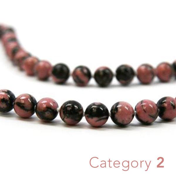 Crystal healing Rhodonite gemstone necklace for emotional transformation 