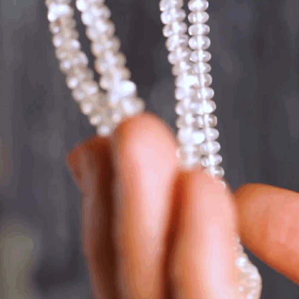 Hanging White Flash Moonstone twinkling in light