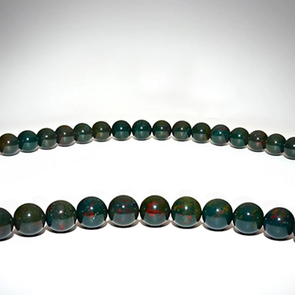 Bloodstone healing gem necklace on a clean, white background, known for boosting the immune system through crystal healing