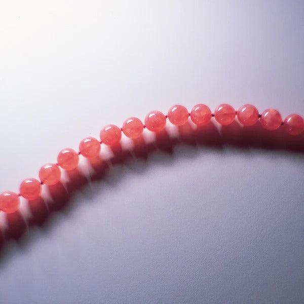 Crystal healing Rhodochrosite necklace known for helping you break free from unhealthy patterns and habits