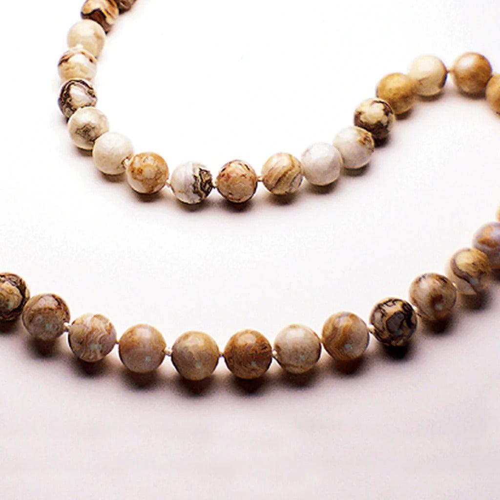 Crystal healing Opalight gemstone necklace known for resolving the karmic causes of a physical condition