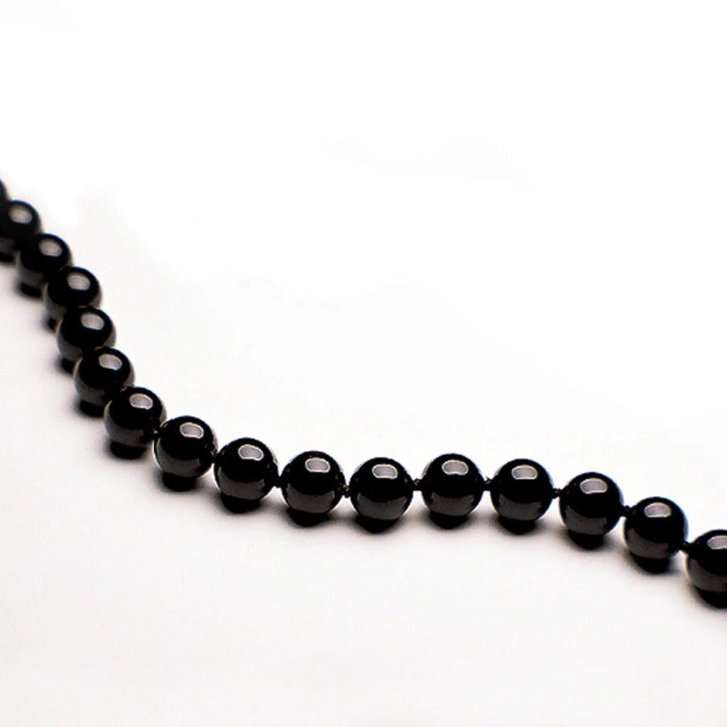 Crystal healing Onyx gemstone necklace known for helping you become grounded and focused