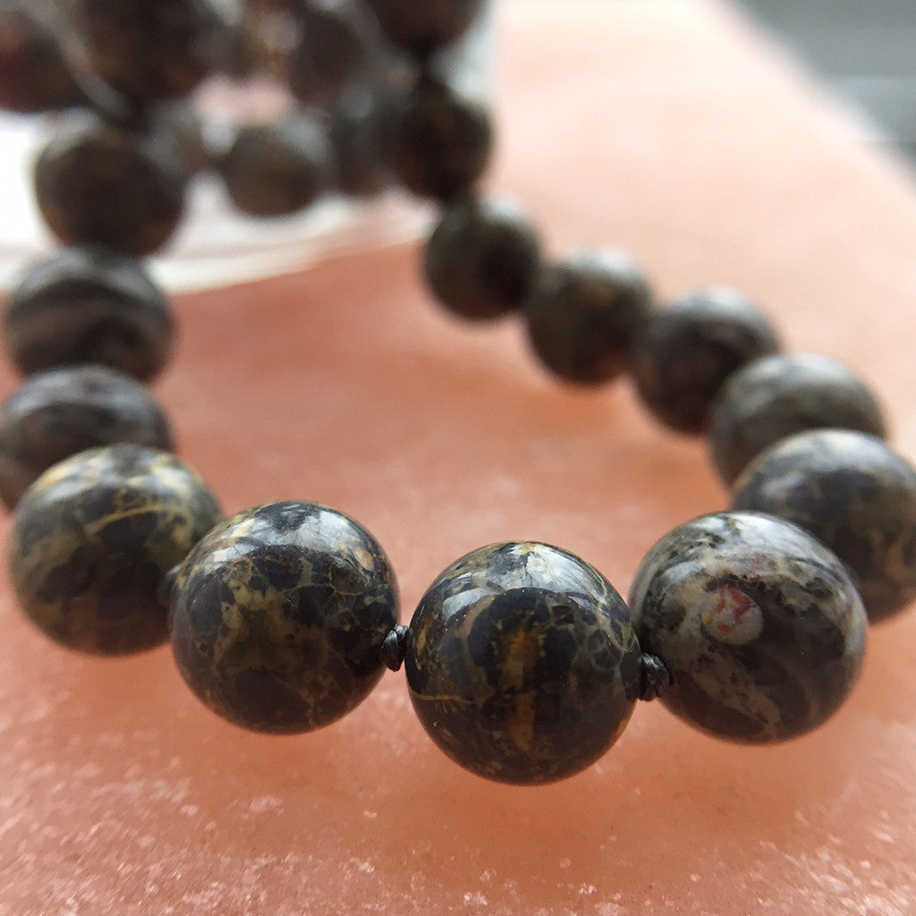 Crystal healing Leopardskin Jasper gemstone necklace known for attracting what you need for physical wellbeing