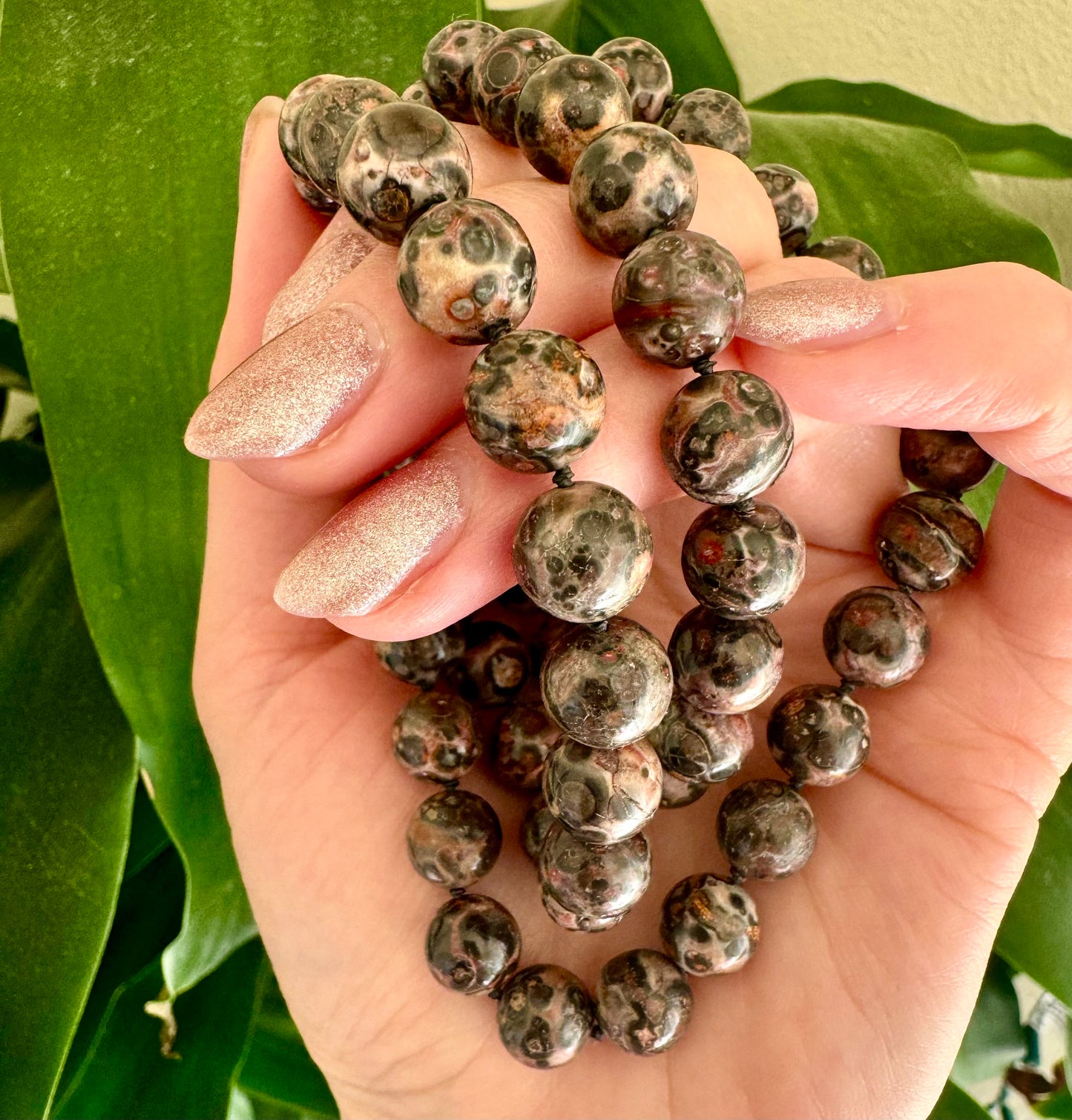 Crystal healing Leopardskin Jasper gemstone necklace known for attracting what you need for physical wellbeing