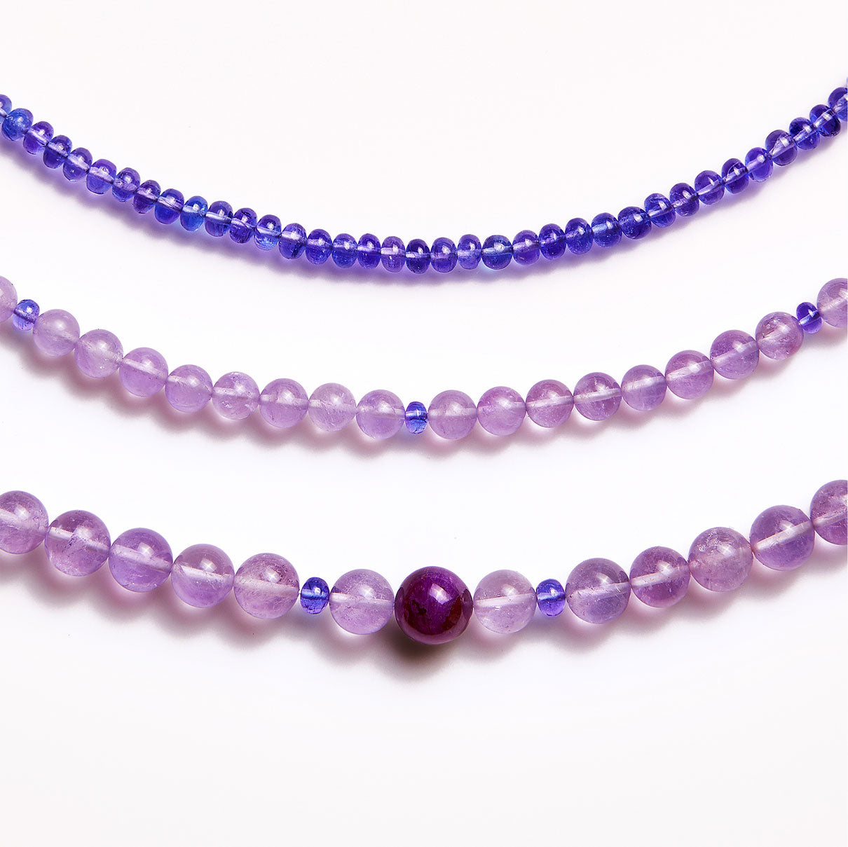 Three different crystal healing gemstone necklaces with Tanzanite 